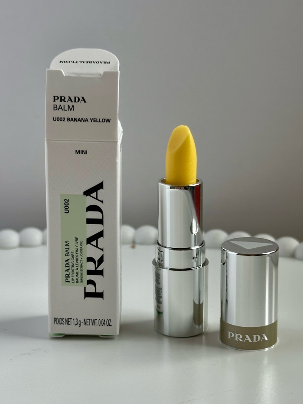 PRADA Hydrating Lip Balm .04oz Mini - Banana Yellow- NIB